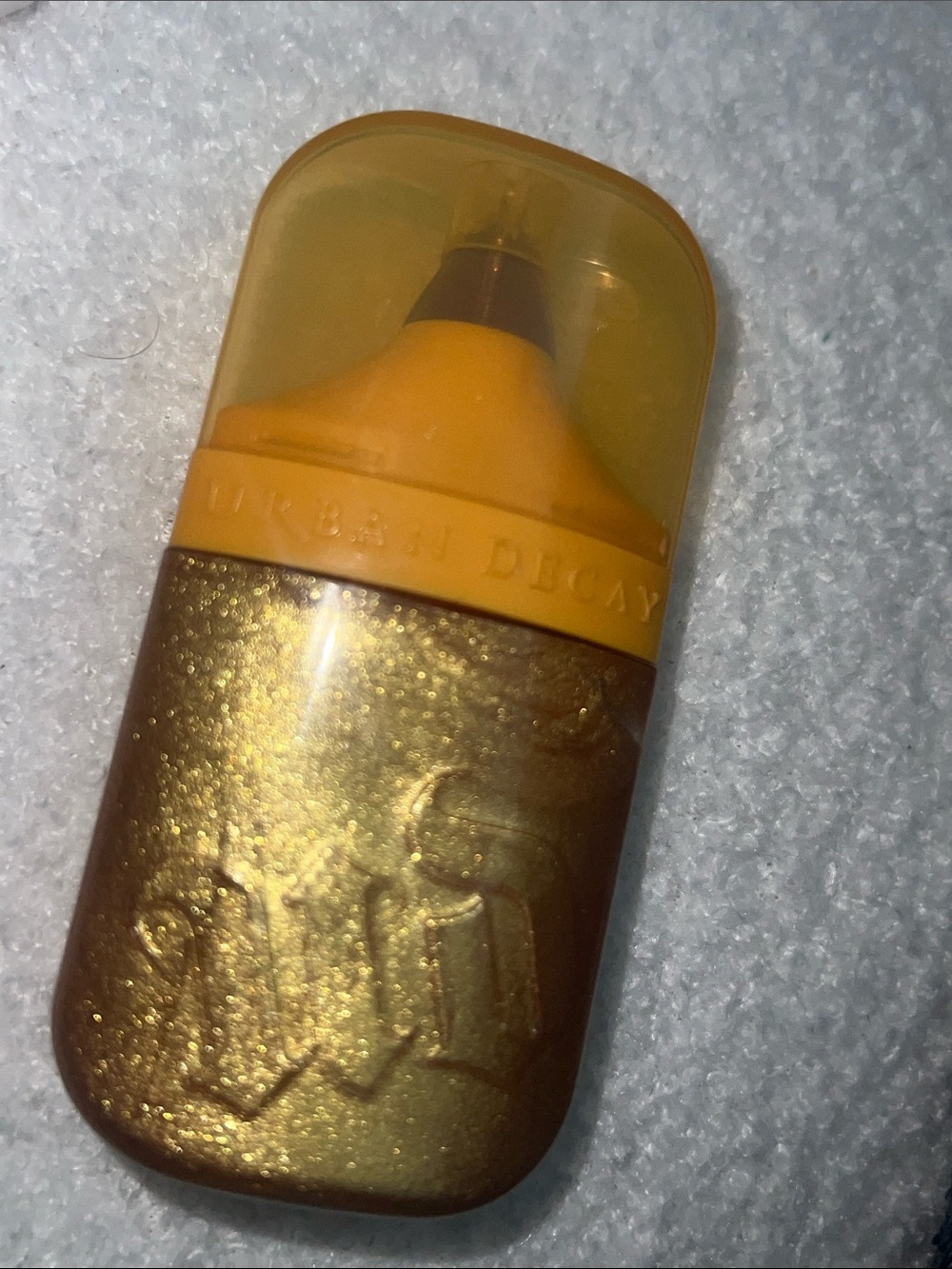 Urban Decay Face Bond Luminzer  — Shimmering Gold